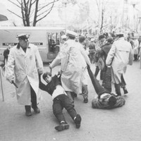 photo of arrest at CORE&amp;#039;s World&amp;#039;s Fair protests